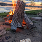 campfire on shore at sunset