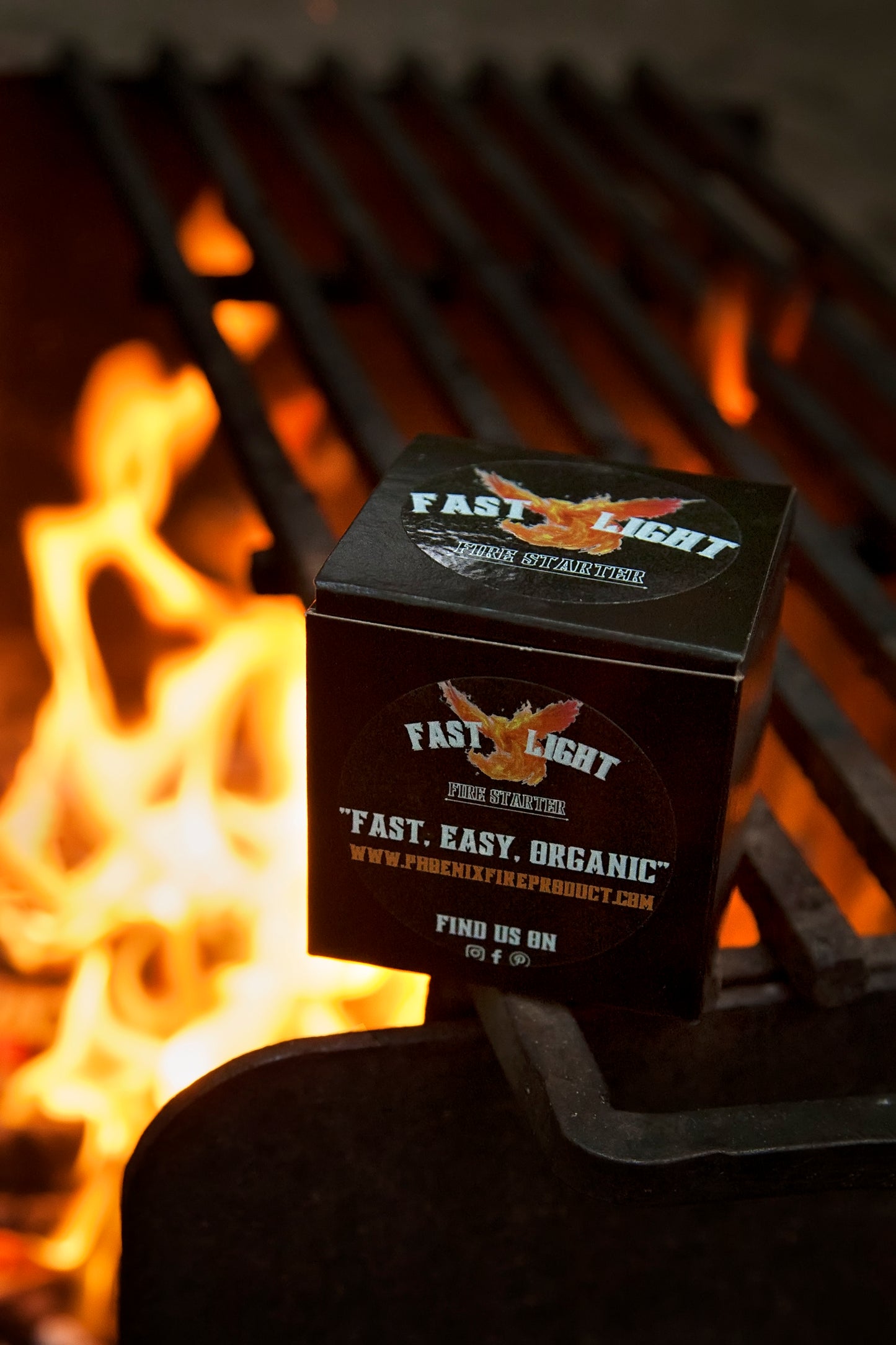 Original 8-Pack Organic Fire Starter on grill over campfire